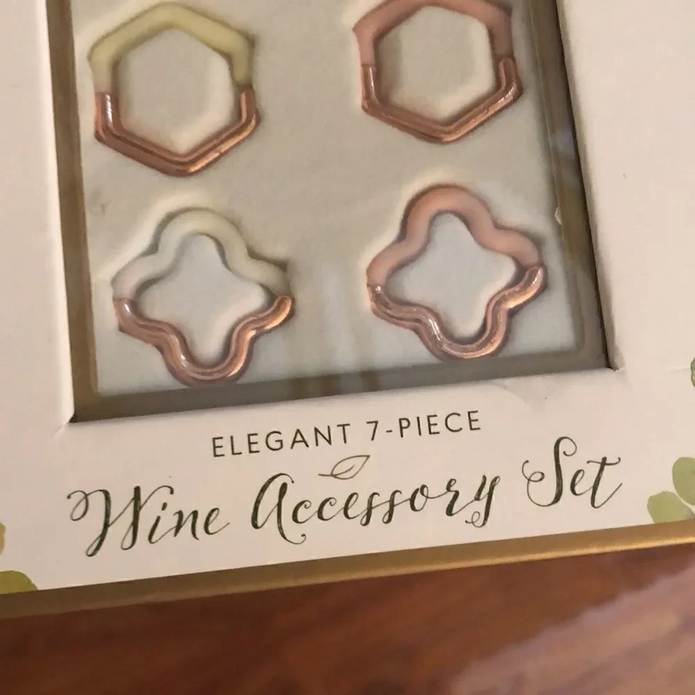 NEW Laura Ashley Seven piece rose gold wine accessory set.